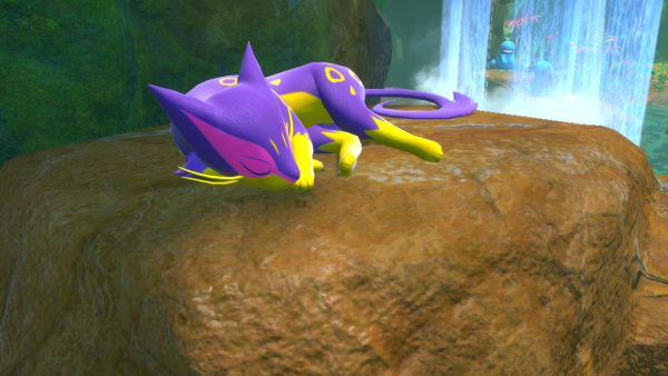 A picture of a Liepard sleeping on a rock by a waterfall