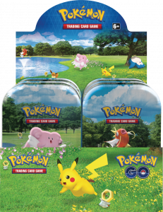 Display box of mini tins featuring Blissey and Magikarp on the front