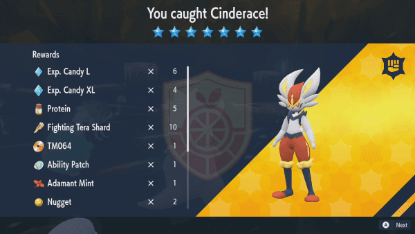 The screen showing catching Cinderace and getting several rewards, including an Ability Patch
