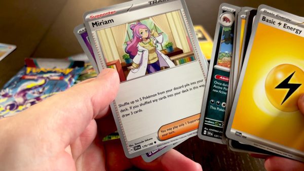 Opening a booster pack with Miriam in it