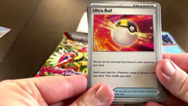 Opening a booster pack with an Ultra Ball in it