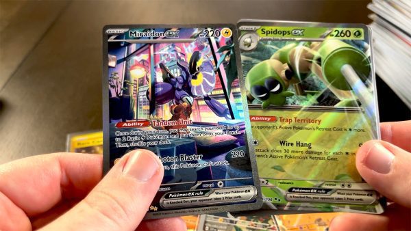 Opening a special illustration Miraidon ex and Spidops ex in a single TCG pack